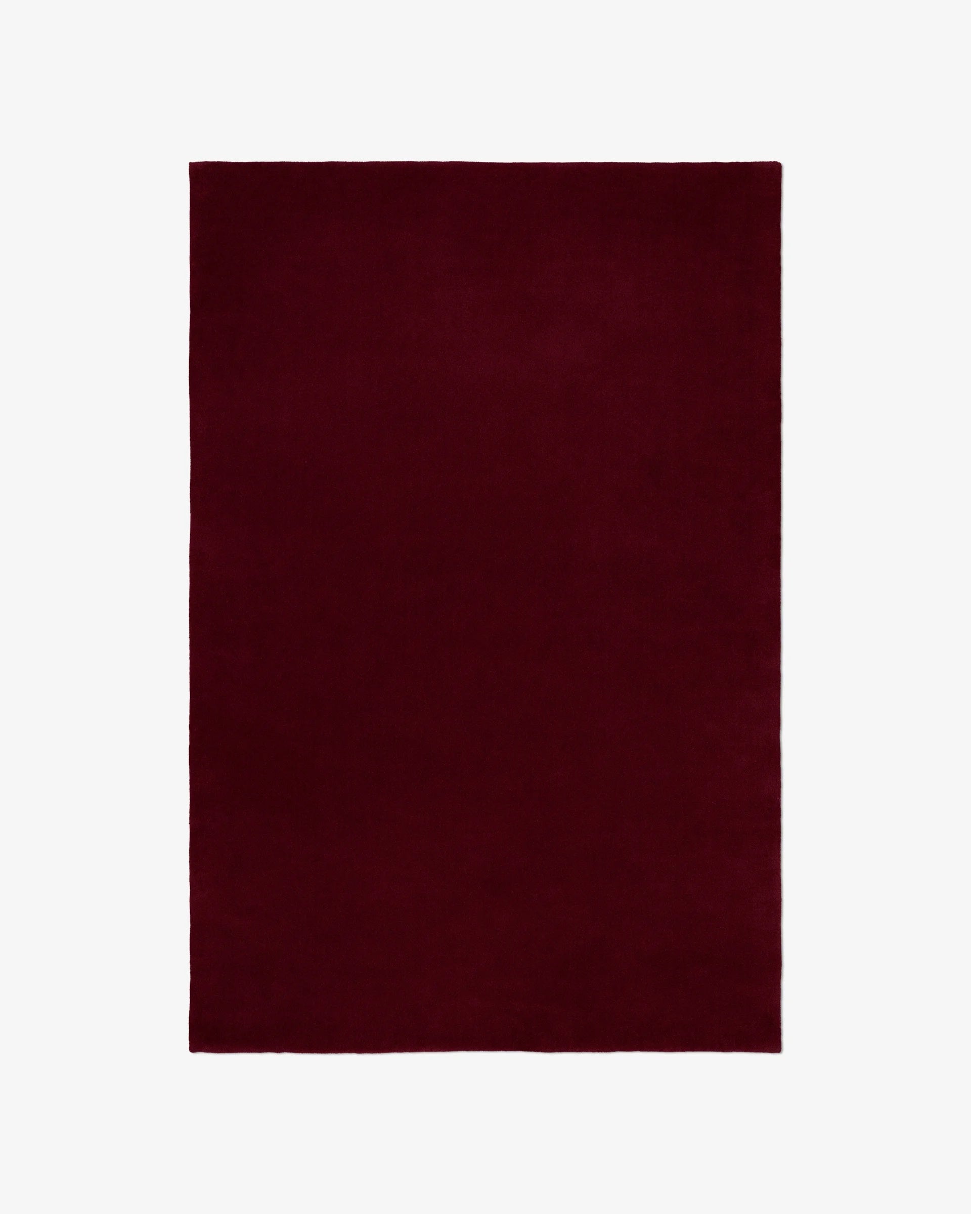 Dark Maroon Woolen Hand Tufted Carpet